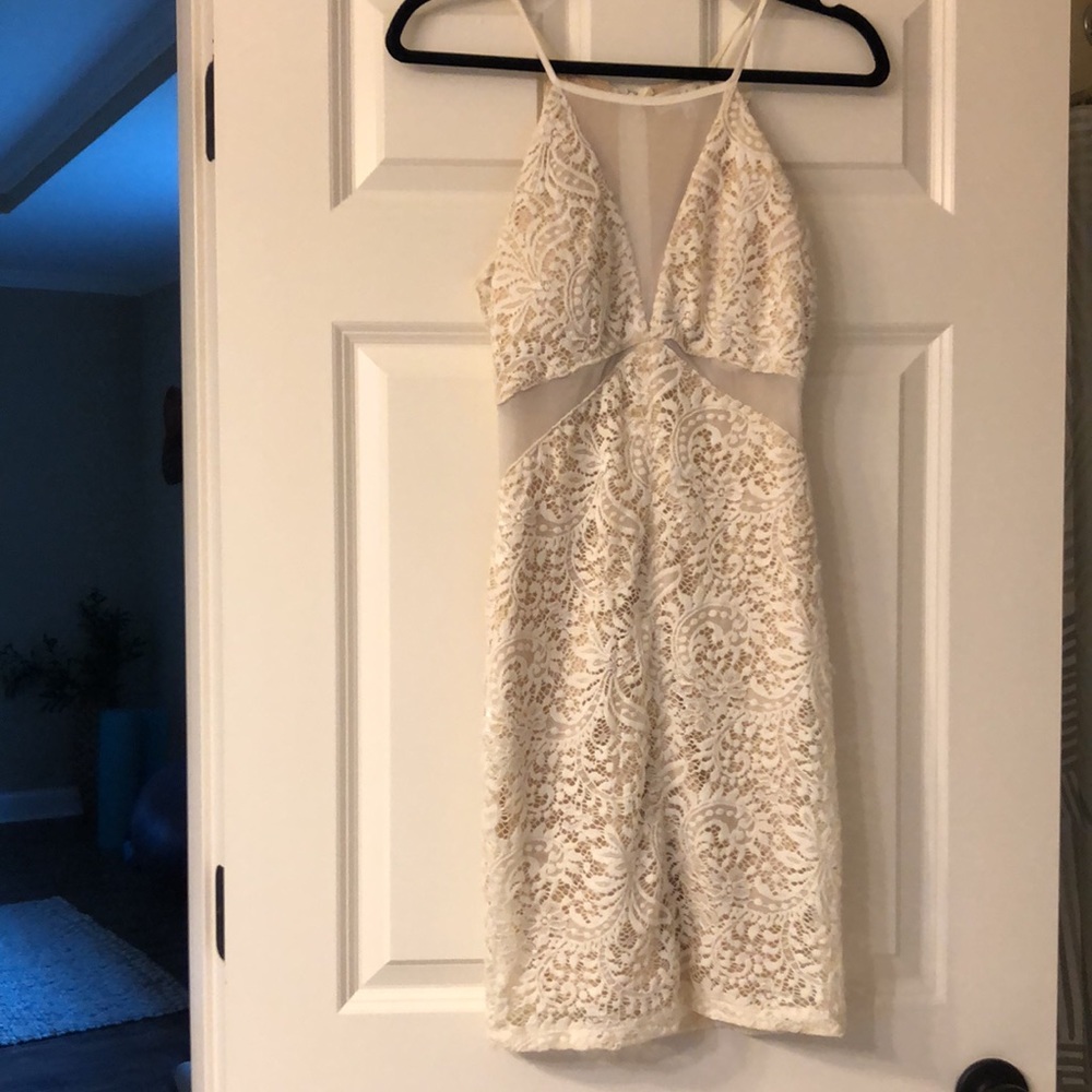 White bodycon dress with mesh cutouts